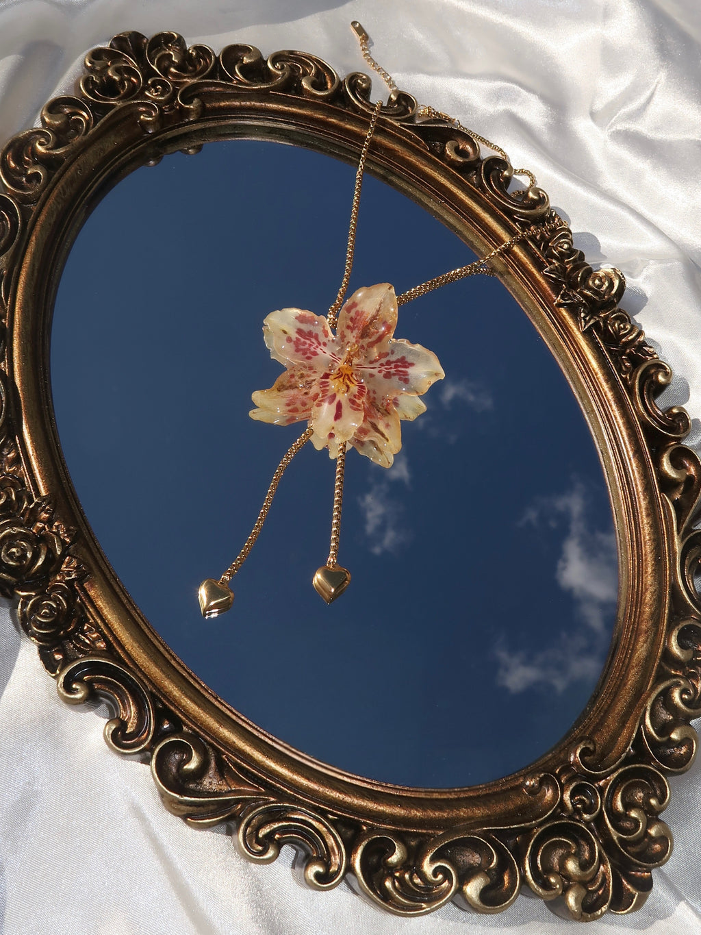 Pulling at My Heartstrings Orchid Necklace