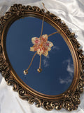Pulling at My Heartstrings Orchid Necklace