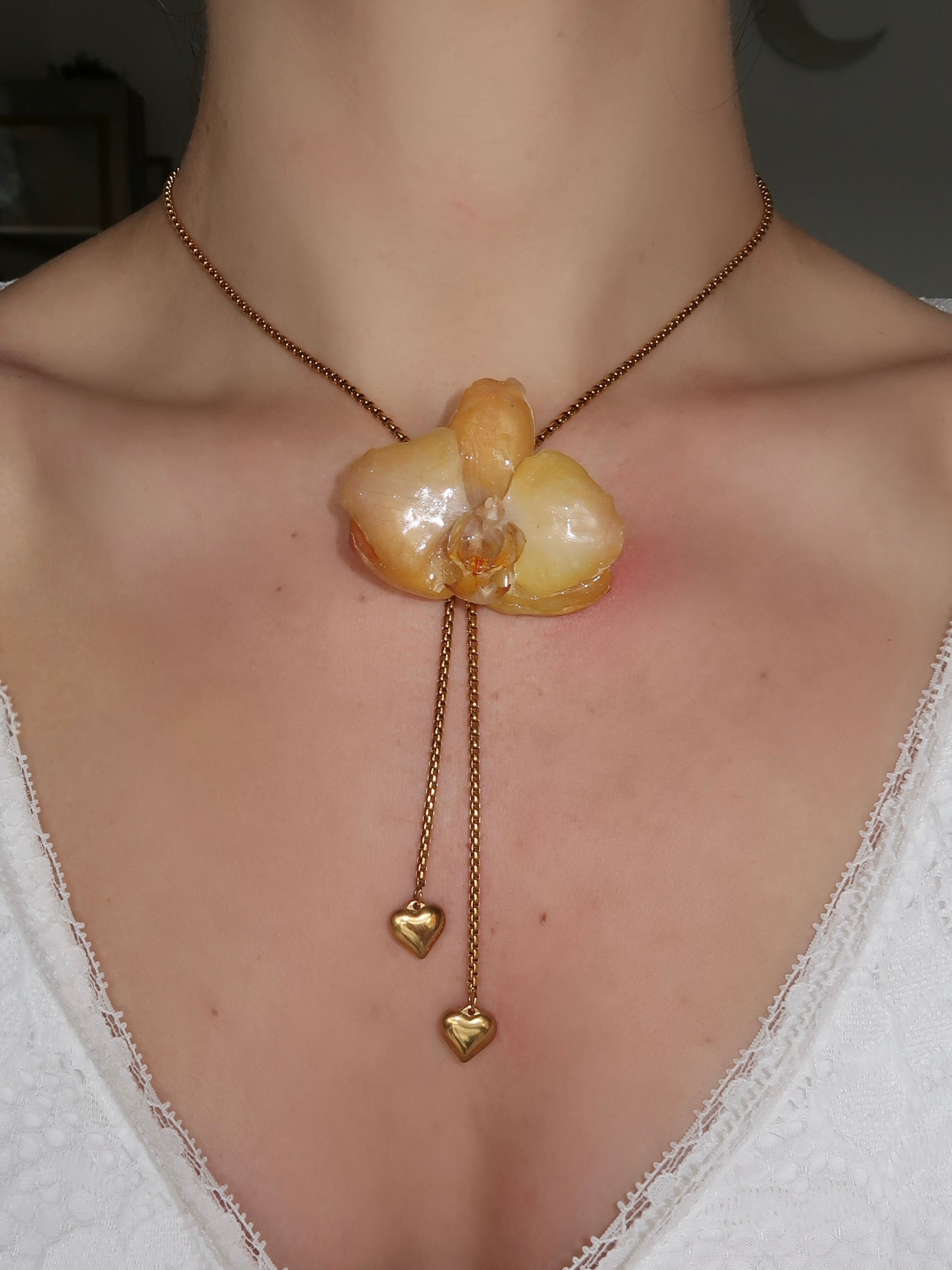 Pulling at My Heartstrings Orchid Necklace