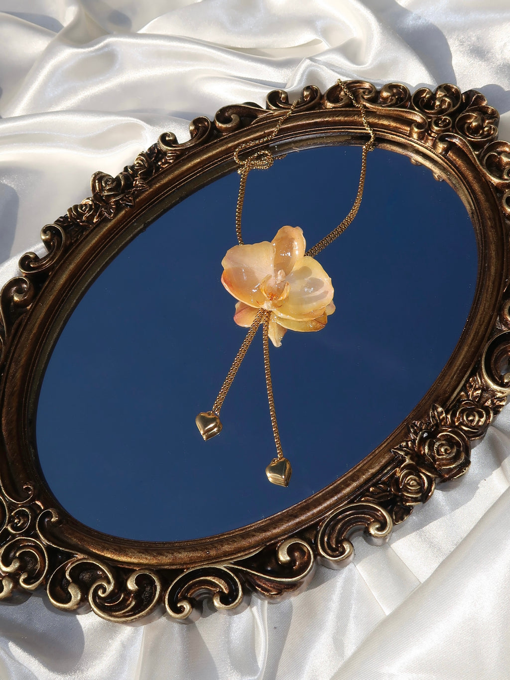 Pulling at My Heartstrings Orchid Necklace