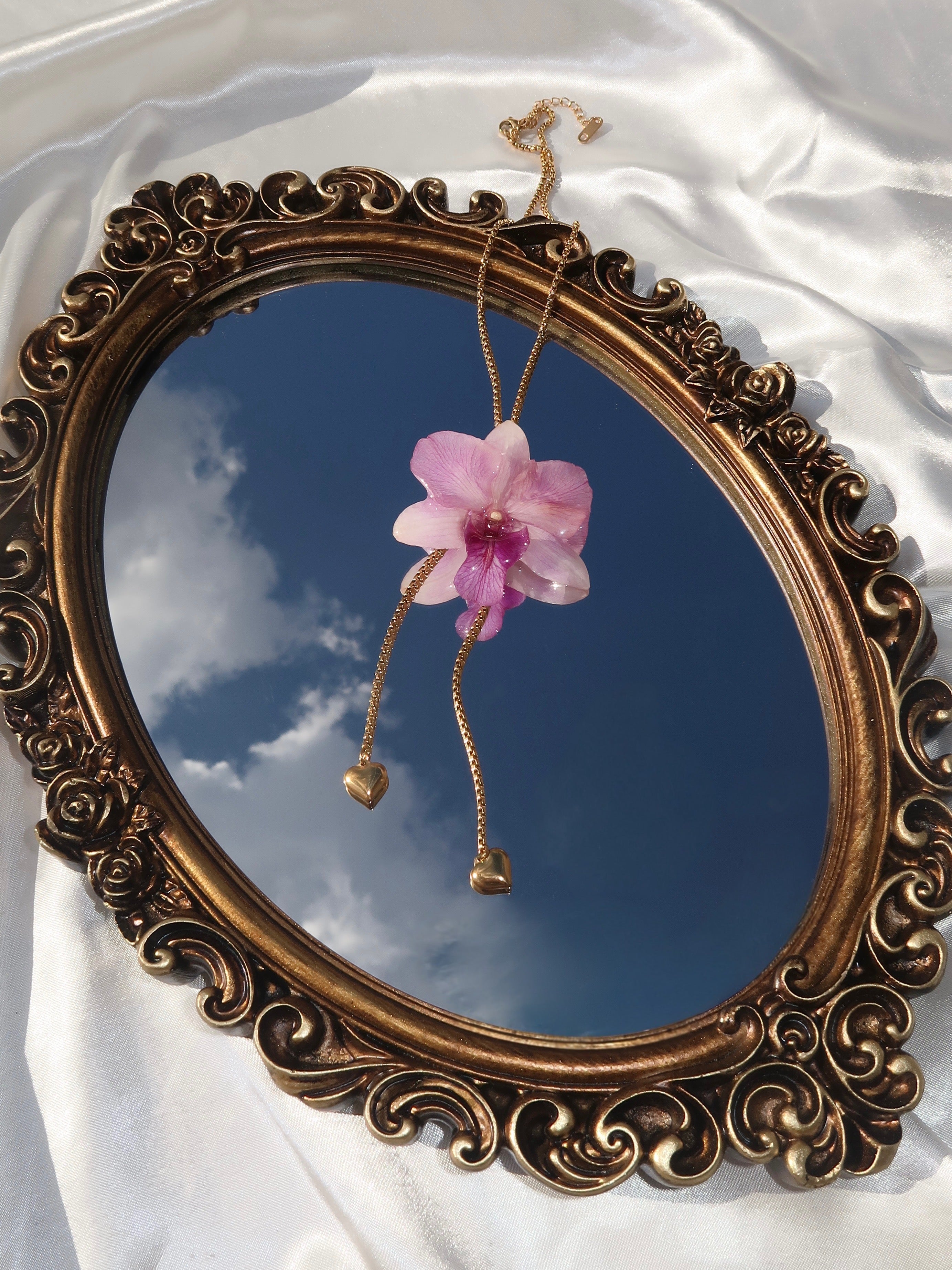 Pulling at My Heartstrings Orchid Necklace