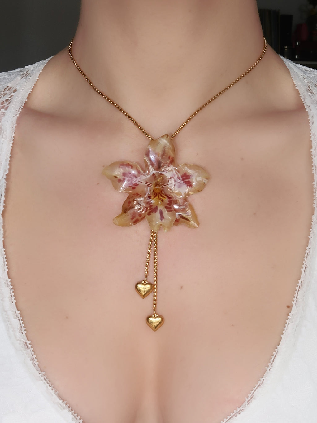 Pulling at My Heartstrings Orchid Necklace