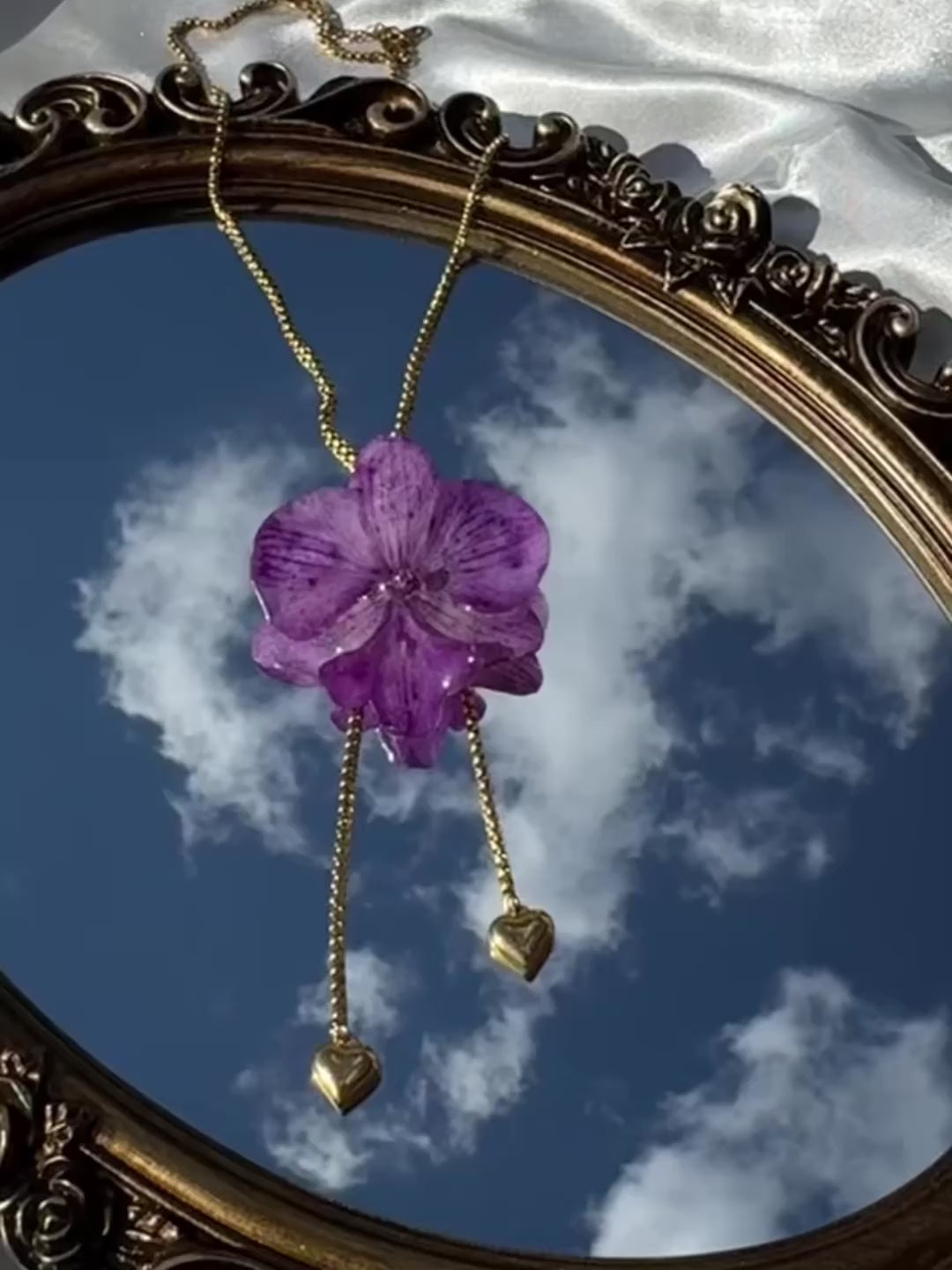 Pulling at My Heartstrings Orchid Necklace
