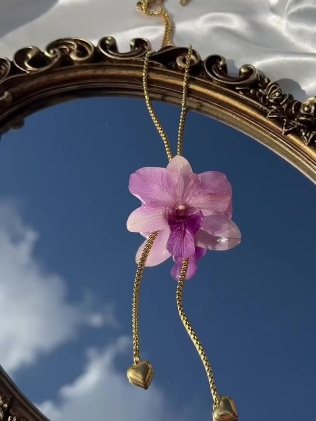 Pulling at My Heartstrings Orchid Necklace
