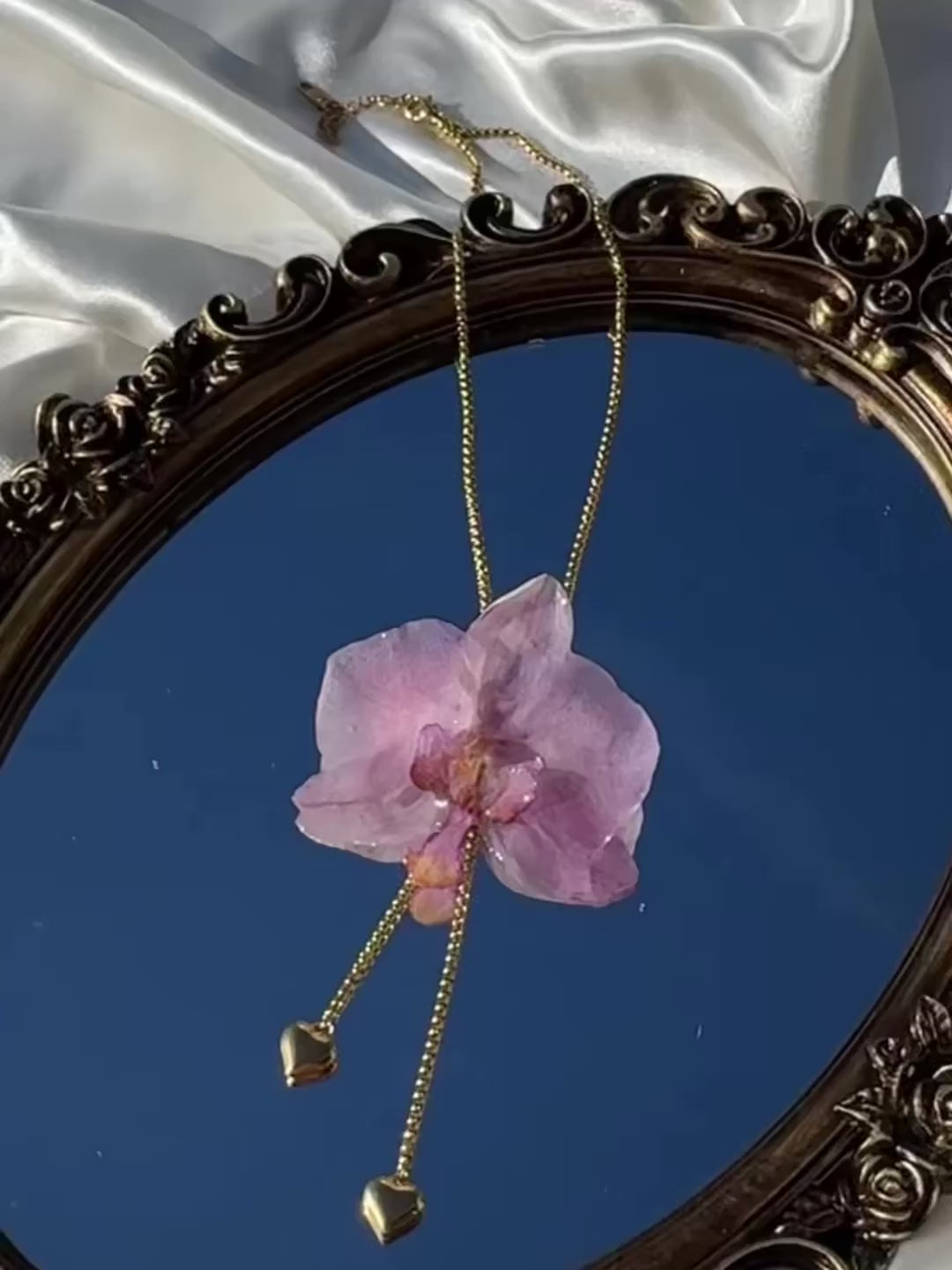 Pulling at My Heartstrings Orchid Necklace