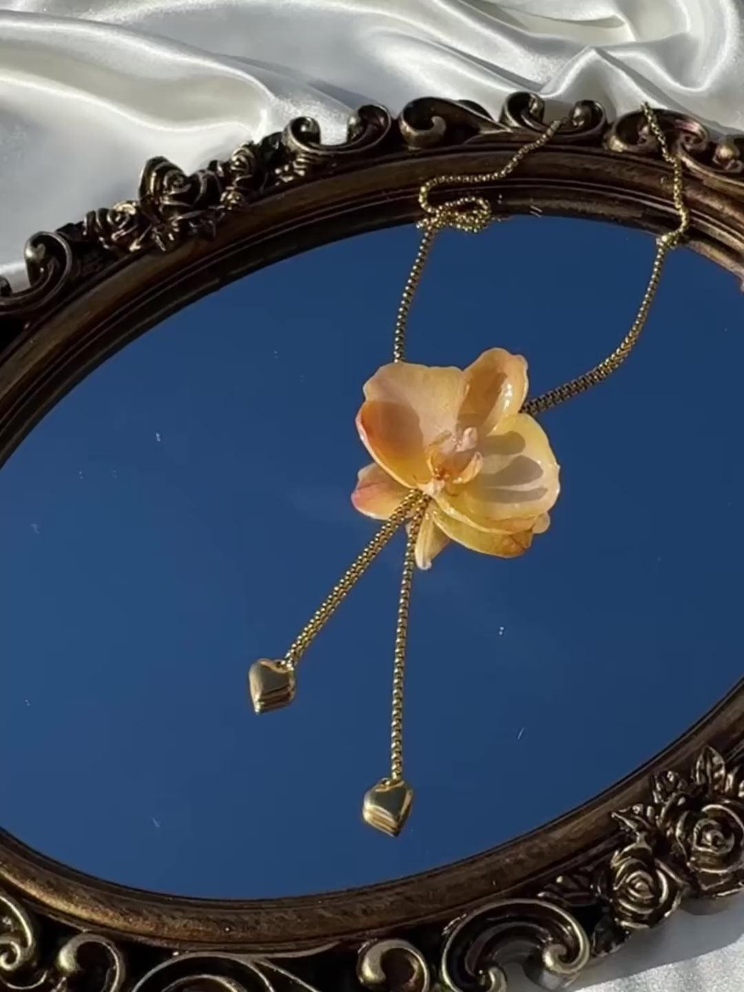 Pulling at My Heartstrings Orchid Necklace